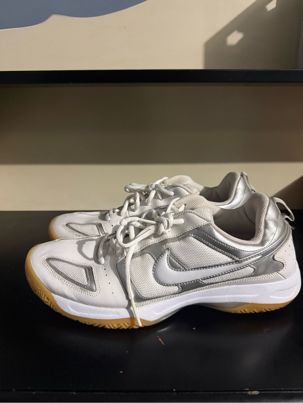 Nike White and Silver volleyball and tennis Sneakers with Gum Outsole.